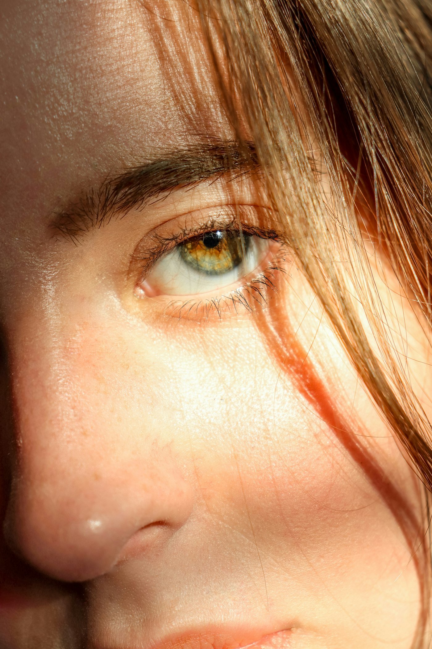 A close up of a person with a cell phone