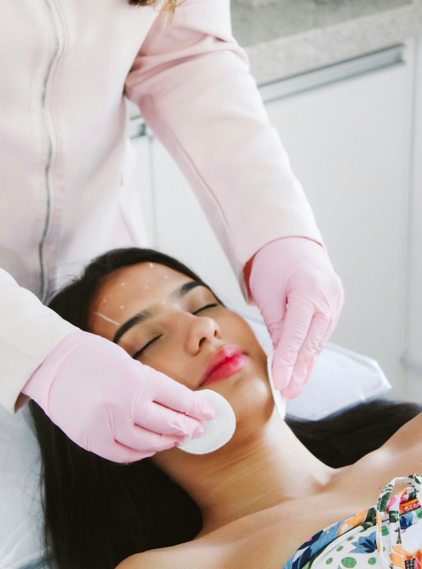 Skin being cleansed before a facial