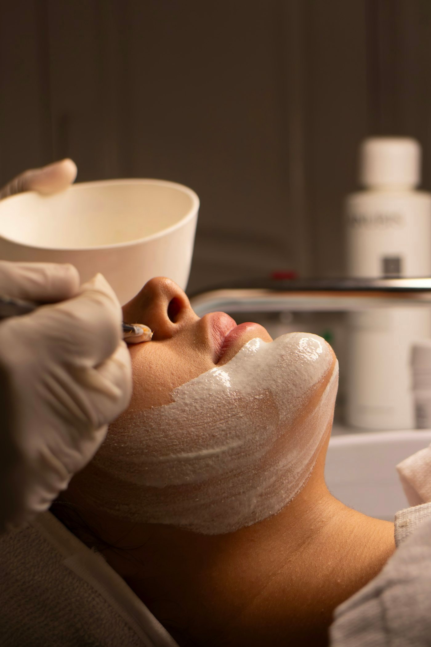 Facial treatment in a calm treatment room